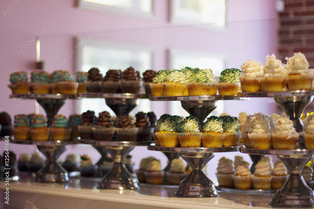 Cupcakes on Display in a Bakery