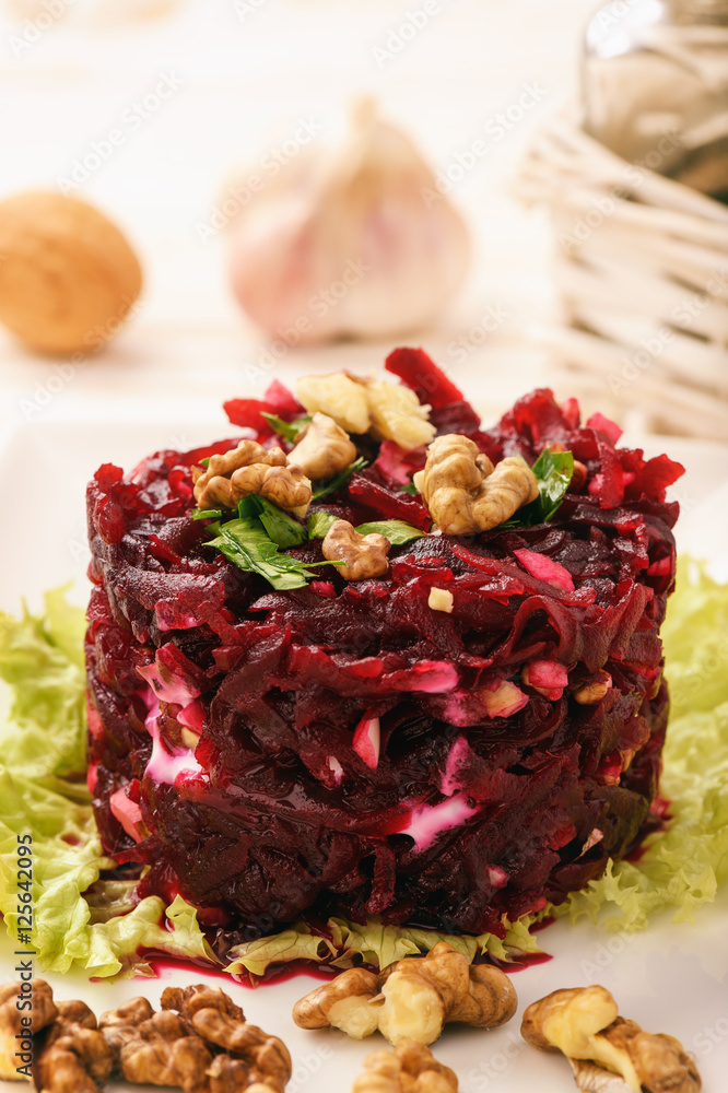 Fototapeta premium Beetroot salad with natural yogurt, garlic and walnut.