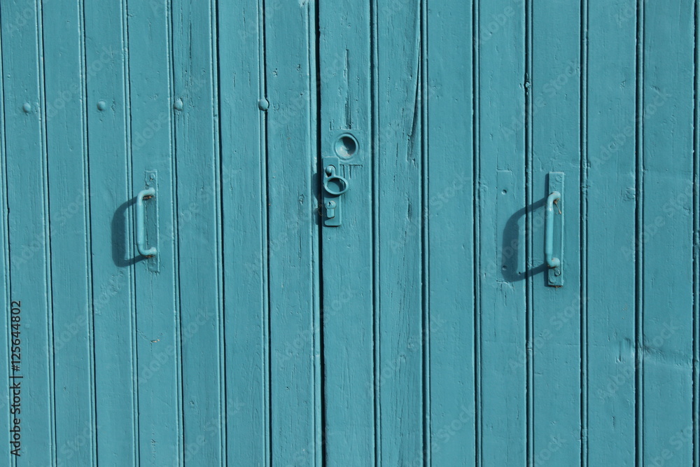 Vieille porte en bois bleue turquoise Vieille porte en bois bleue turquoise