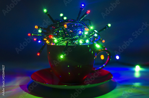 Christmas lights in the cup.