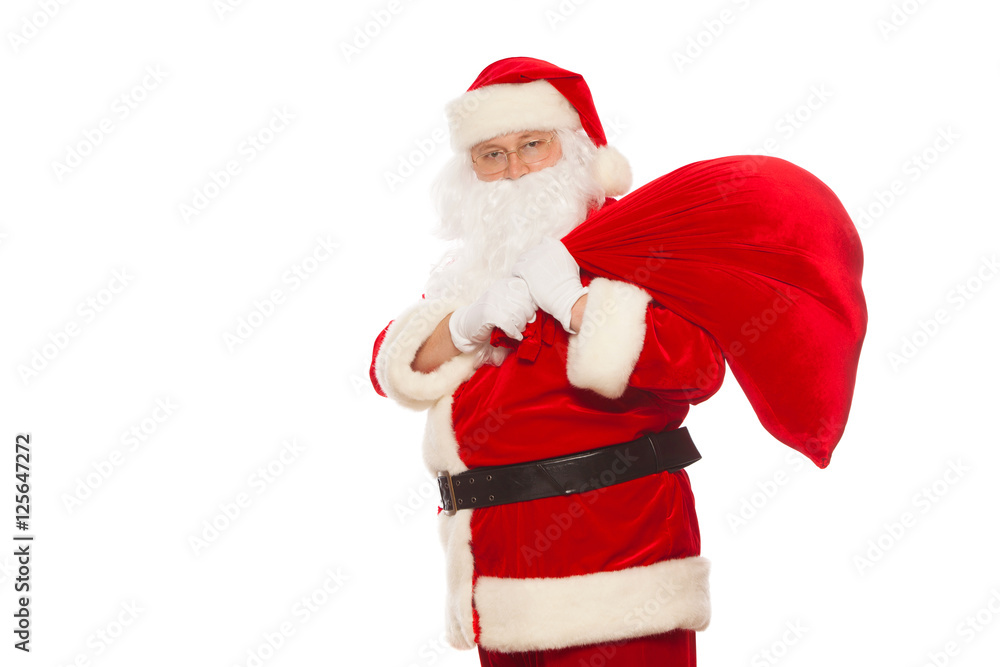 real Santa Claus carrying big bag and showing ok, isolated on white background Christmas