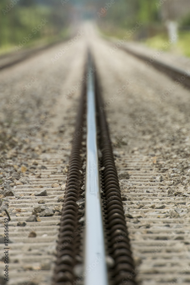 Detailed close up photo of a railroad track