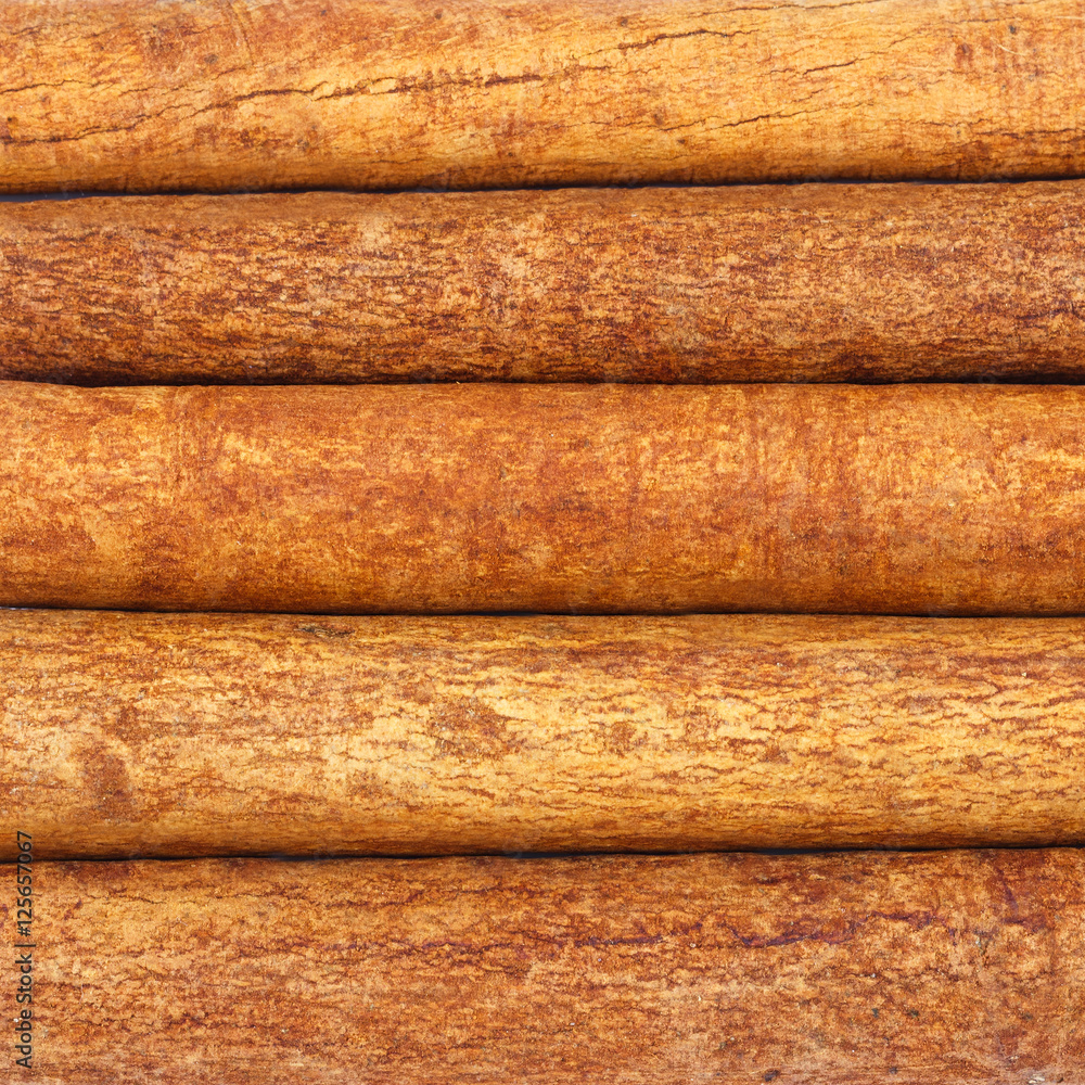 Background of cinnamon sticks, top view Background of cinnamon sticks, top view