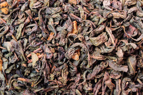 Background of dry green tea with flavors