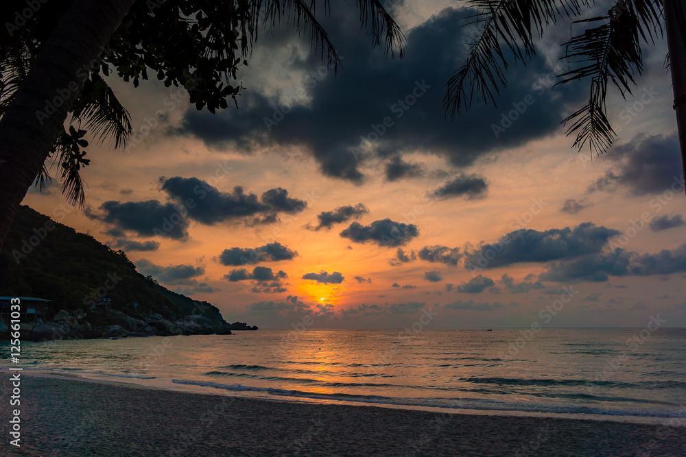 Sunrise over full moon party beach in Thailand