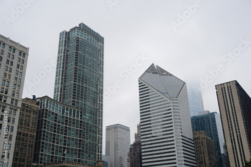 Buildings from the Chicago against foggy and cloudy sky © R MACKAY