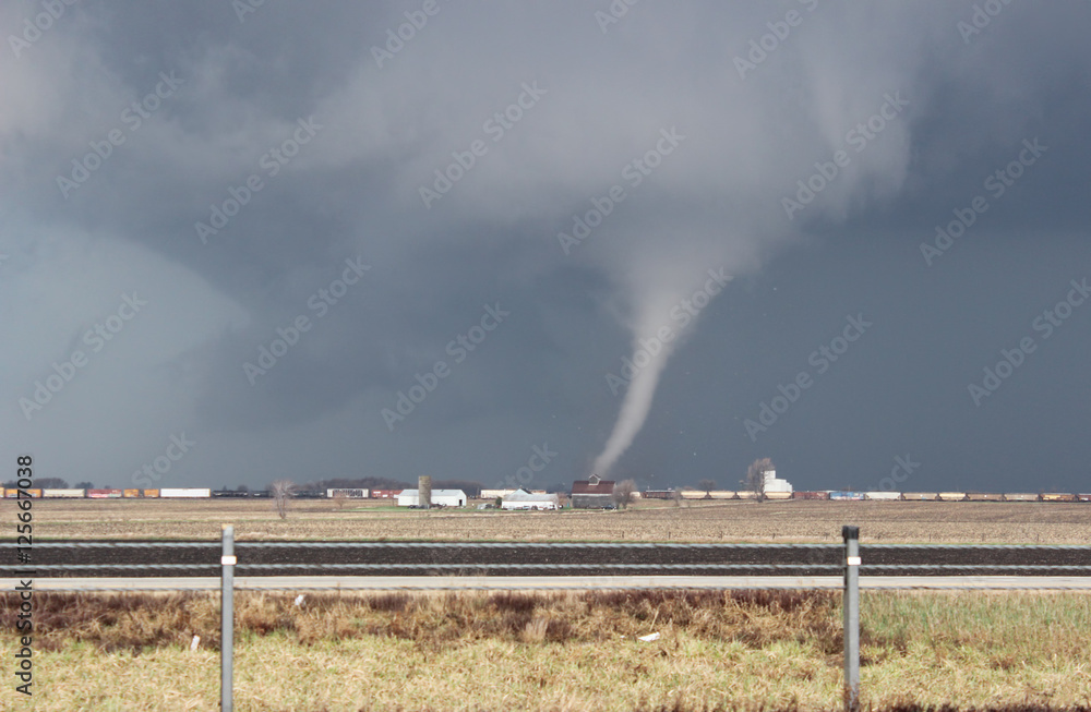 A small cone tornado does damage near Franklin Grove, IL on April 9