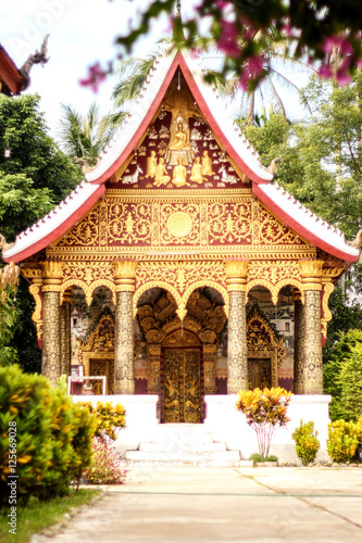 Golden Laos style temple building landmark in Laos