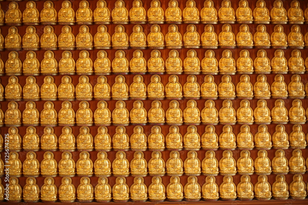Rows Of Golden Buddha Statues at Wat Leng Nei Yi 2 in Nonthaburi, Thailand