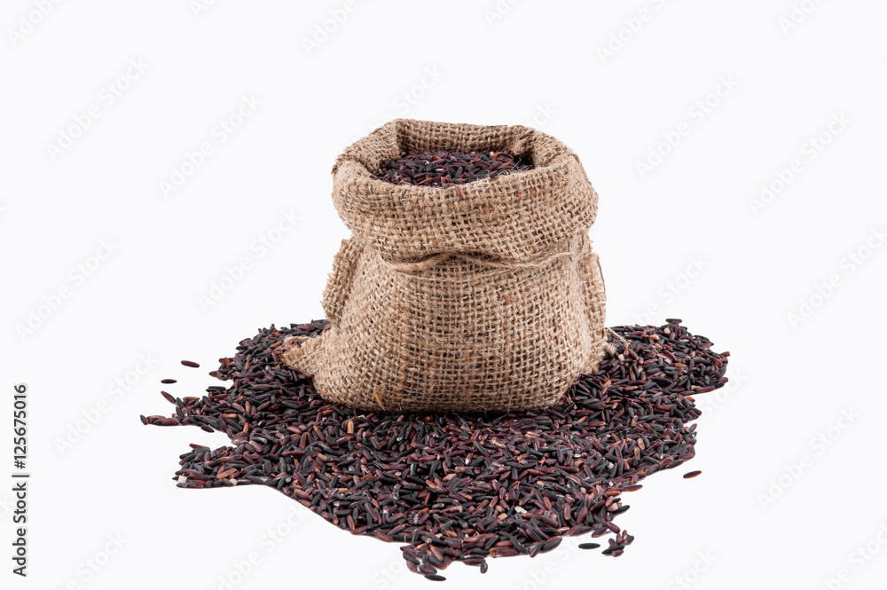 Riceberry rice in sacks on a white background Riceberry rice in sacks on a white background