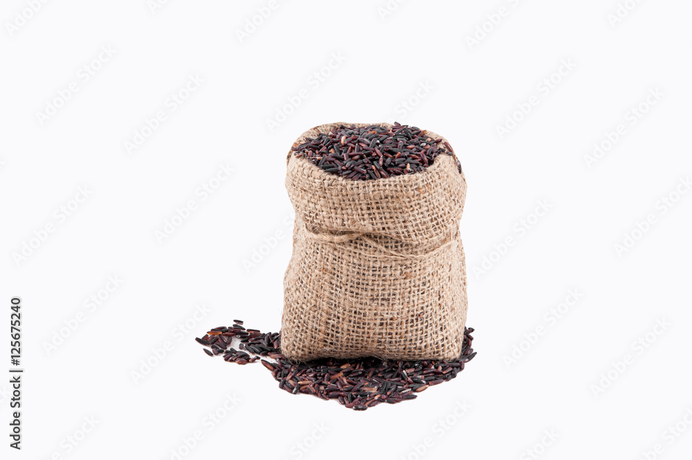Riceberry rice in sacks on a white background Riceberry rice in sacks on a white background