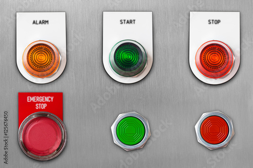 Obraz na płótnie Push button switch with emergency stop and start stop alarm lamp signal on stainless steel panel wit clipping path w salonie