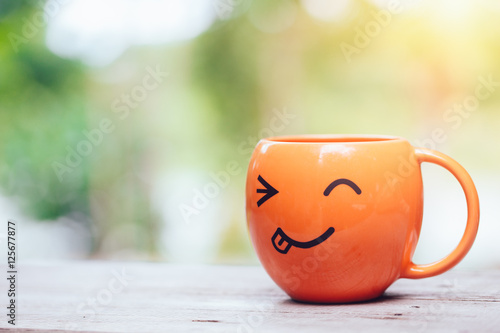 Smile coffee Cup in The Garden morning sun light. © Quality Stock Arts