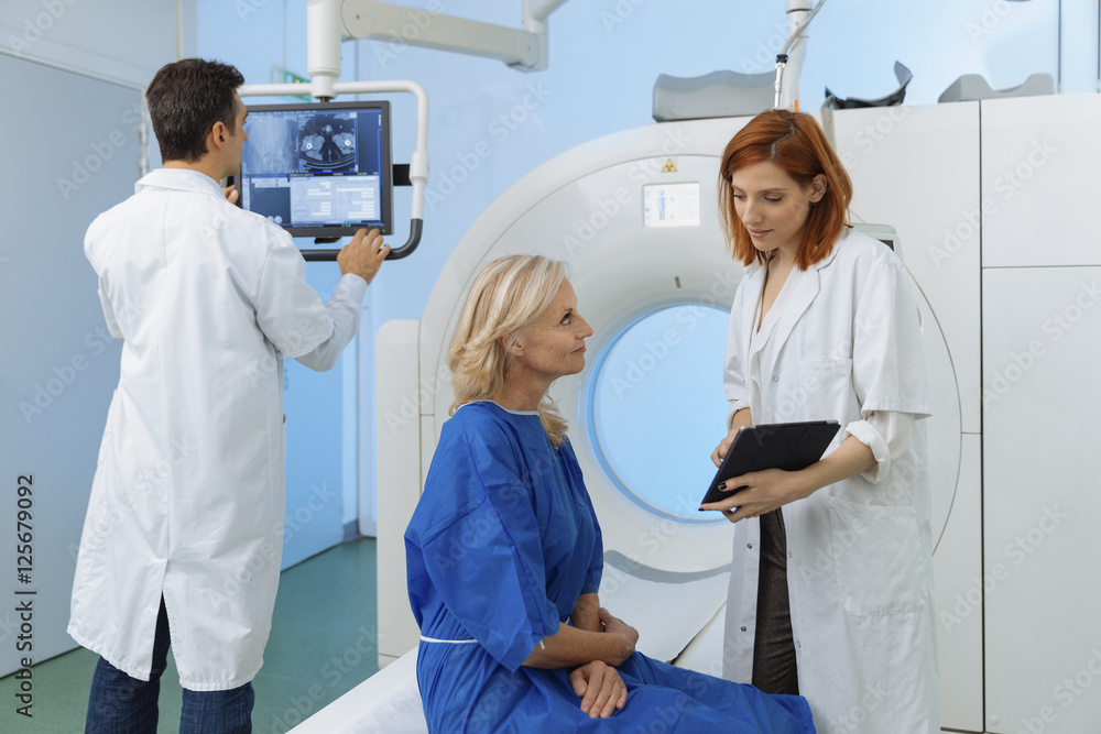 Radiologic technician and Patient being scanned and diagnosed on Radiologic technician and Patient being scanned and diagnosed on