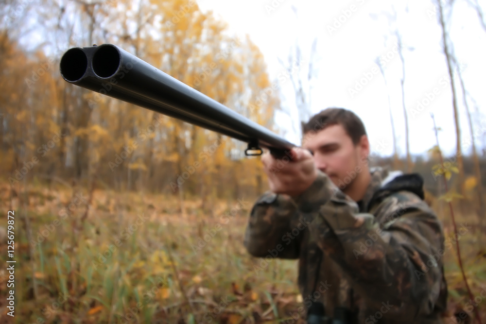 Fototapeta premium man hunter outdoor in autumn hunting