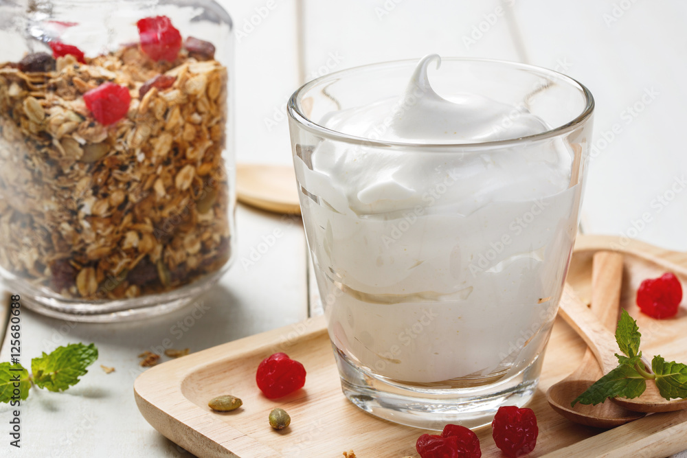 Homemade yogurt with granola, dried fruit and nuts bio - most he Homemade yogurt with granola, dried fruit and nuts bio - most he