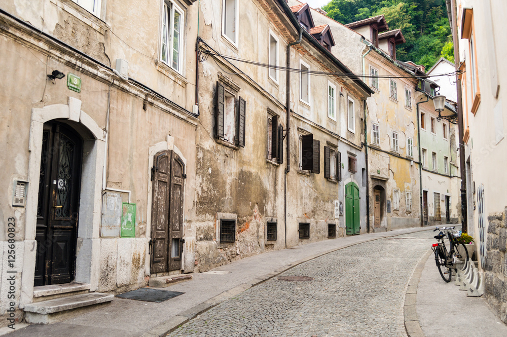 Fototapeta premium LJUBLJANA, SLOVENIA - JUNE 27, 2015: Old street in Slovenian capital Ljubljana