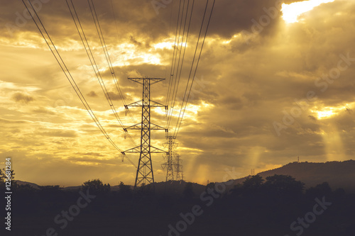 High voltage post. High-voltage tower sky background - Vibrant c
