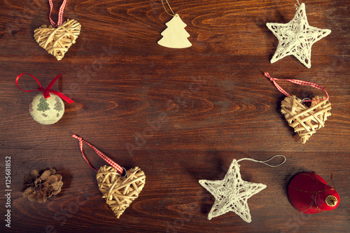 Christmas decor and stars on wooden background