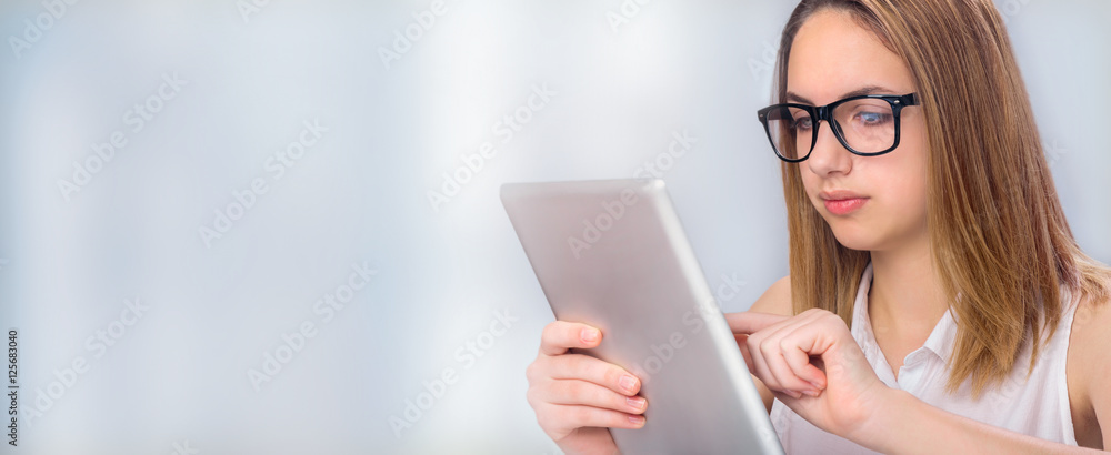 Young woman using tablet . Young woman using tablet .