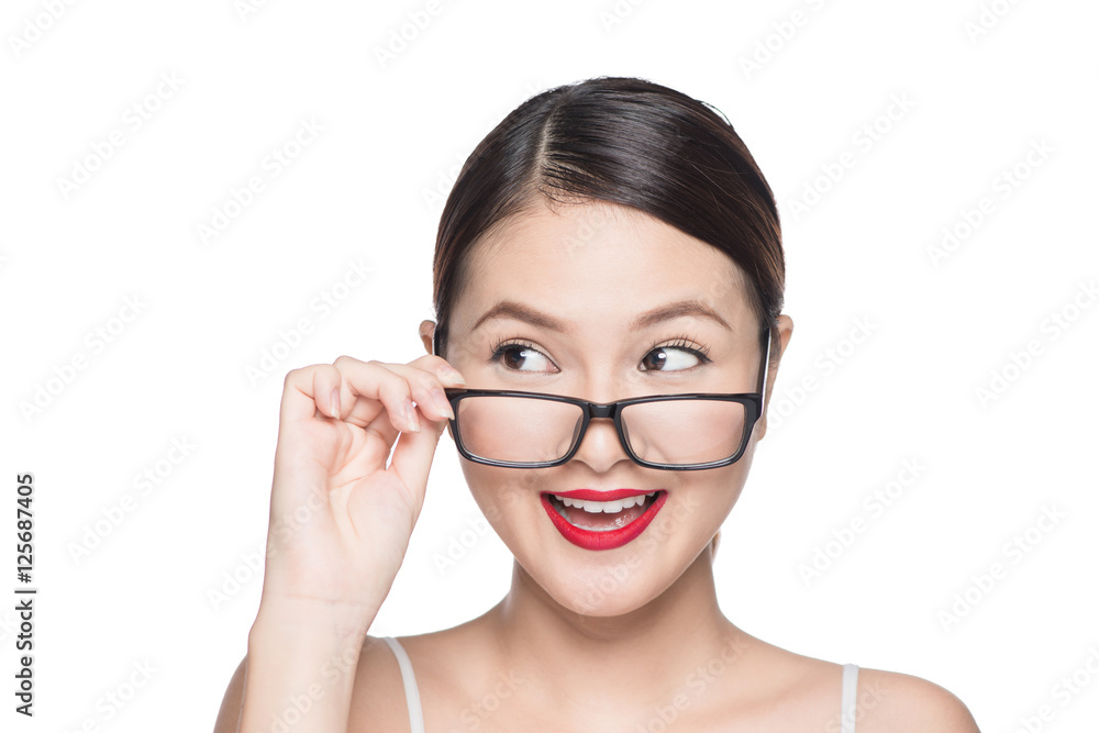 Beauty asian model girl with perfect skin wearing glasses, isola