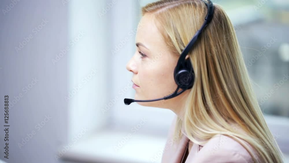 businesswoman with headset talking at office businesswoman with headset talking at office