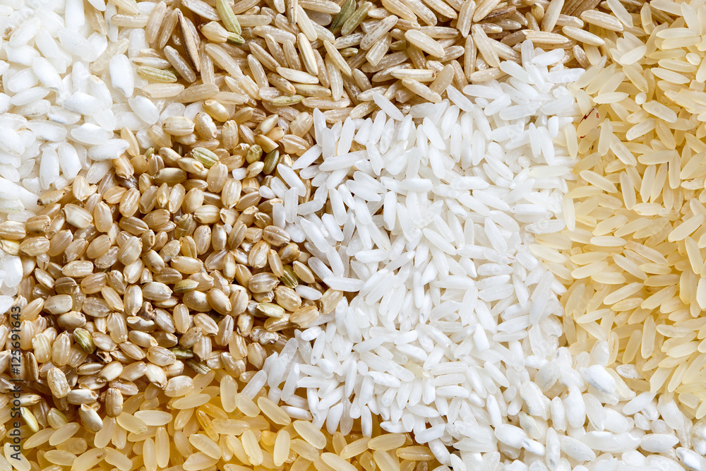 Abstract pattern made of white, brown and parboiled rice from above. Abstract pattern made of white, brown and parboiled rice from above.