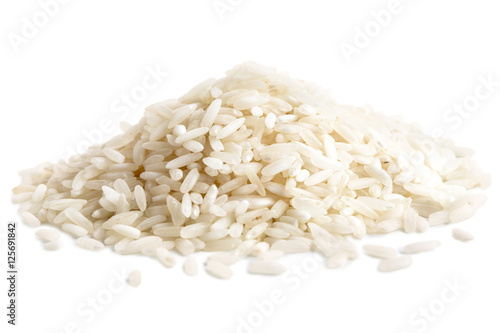 Fotografie Pile of long grain white rice isolated on white.
