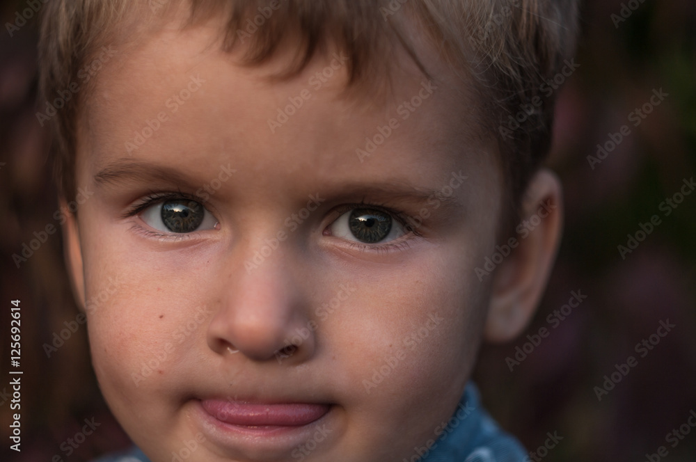 close-up portrait of child. funny little boy. close-up portrait of child. funny little boy.