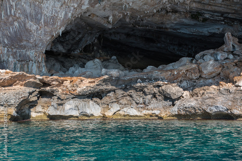 Sardinia Coastline: Rock with Big Hole near Sea, Italy