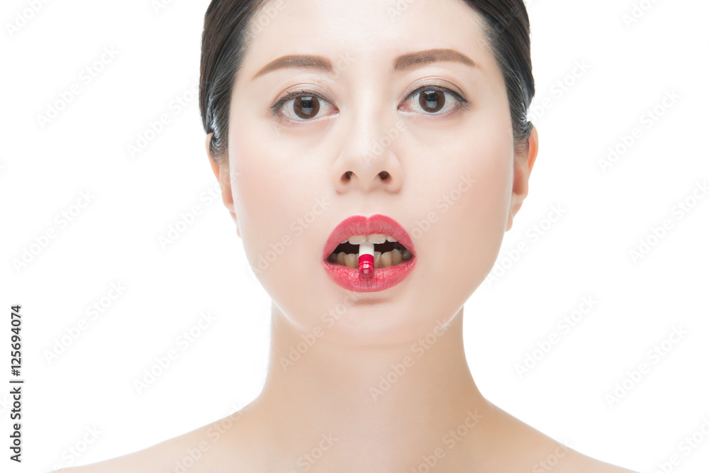 beautiful fashion asian woman bite medicine pill for medical tre beautiful fashion asian woman bite medicine pill for medical tre