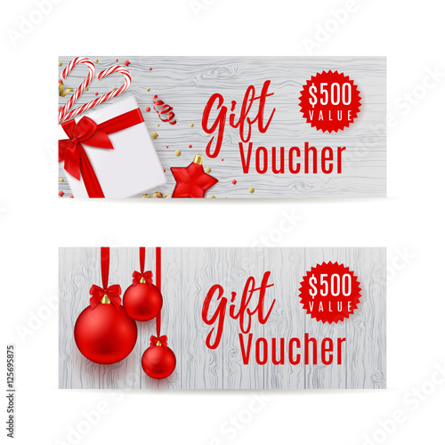 Gift vouchers template with wooden texture. Unusual design of certificate usable for coupon, invitation, diploma and ticket. Background with red toys, candies and confetti.