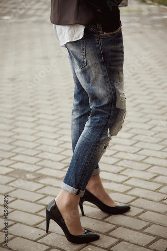 girl in jeans and heels