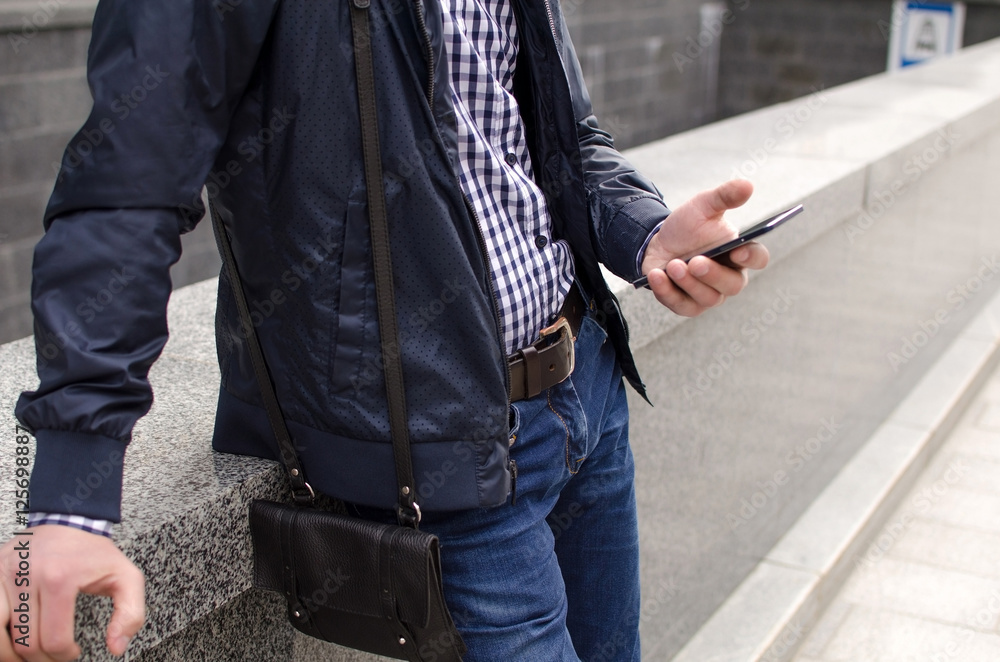 Young man using his phone Young man using his phone