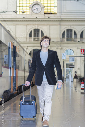 Wallpaper Mural Passenger at the train station Torontodigital.ca