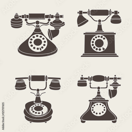 Set of vector retro phones on a gray background