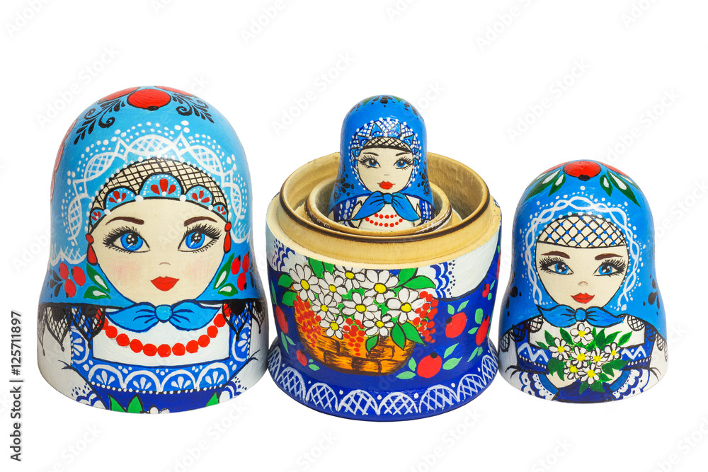 Three traditional Russian matryoshka dolls and blanks for painting dolls. Clean matryoshka.