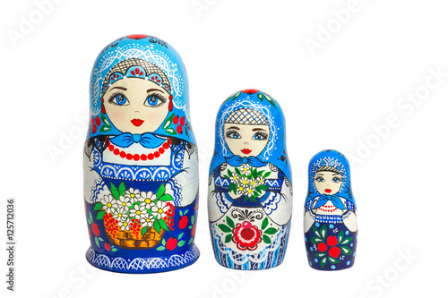 Three traditional Russian matryoshka dolls and blanks for painting dolls. Clean matryoshka.
