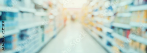 Wallpaper Mural Empty Supermarket Aisle and Shelves in blur background Torontodigital.ca