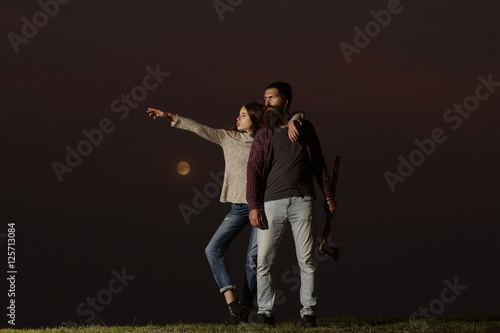 embracing couple on twilight