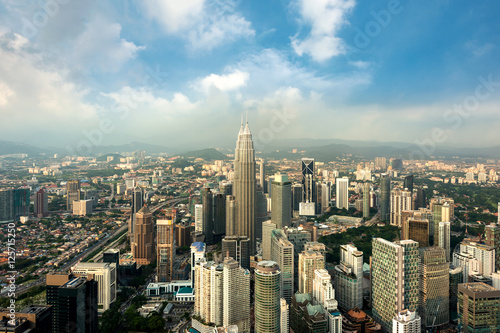 Kuala Lumpur skyline and skyscraper before sunset in Malaysia.