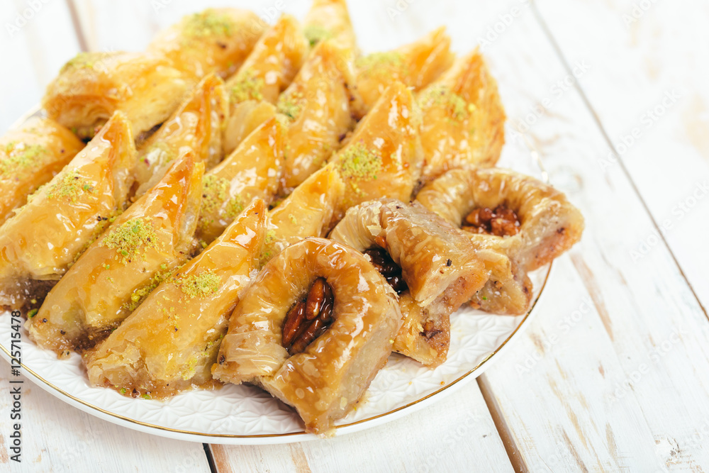 traditional eastern desserts on wooden background traditional eastern desserts on wooden background