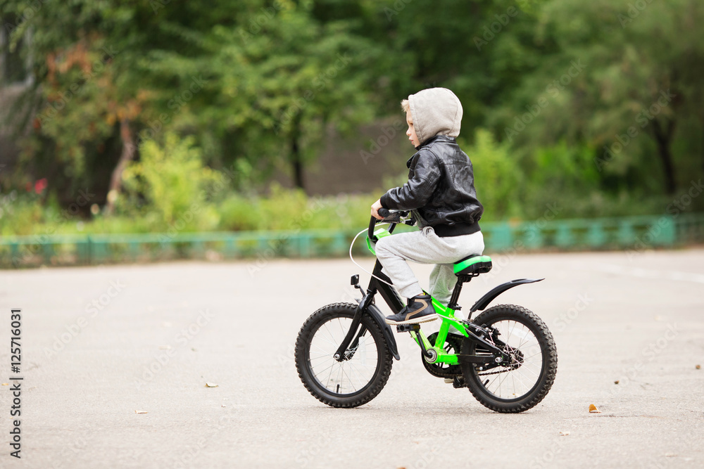 portrait of adorable little urban boy wearing black leather jack portrait of adorable little urban boy wearing black leather jack