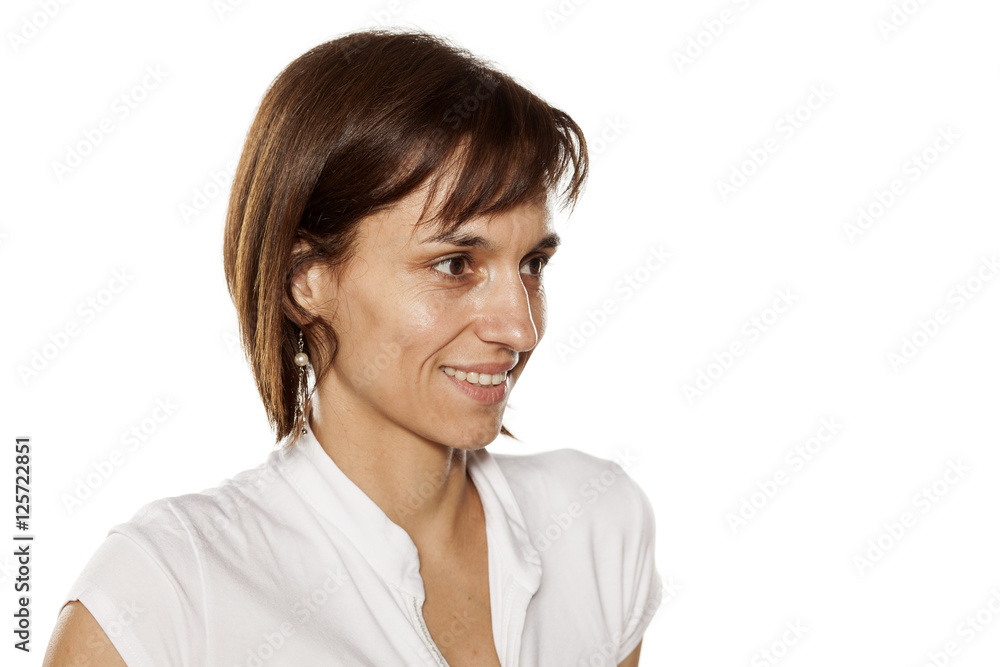 Portrait of smiling middle-aged woman with no makeup Portrait of smiling middle-aged woman with no makeup