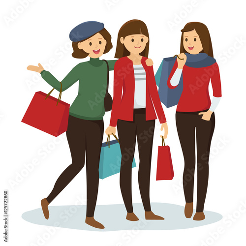 Group of girl friends go shopping for Christmas