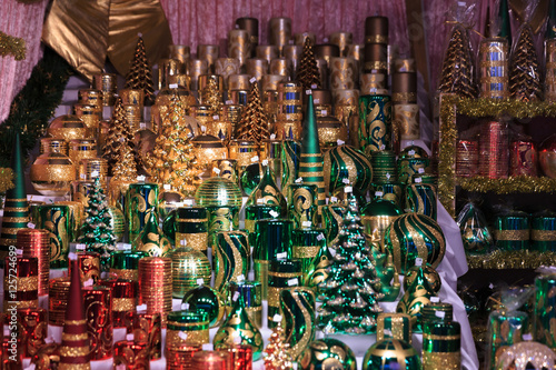 Colorful close up details of christmas fair market. Candles decorations for sales.