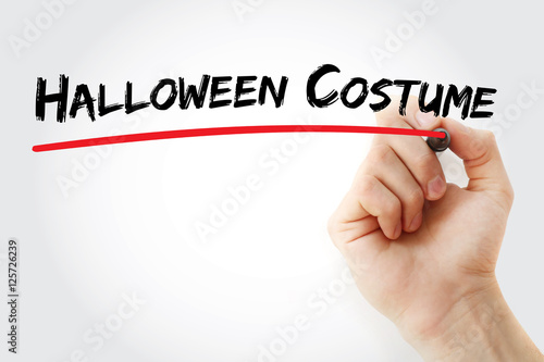 Hand writing Halloween costume with marker, concept background