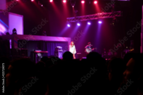 Blurred background : Bokeh lighting in indoor concert.