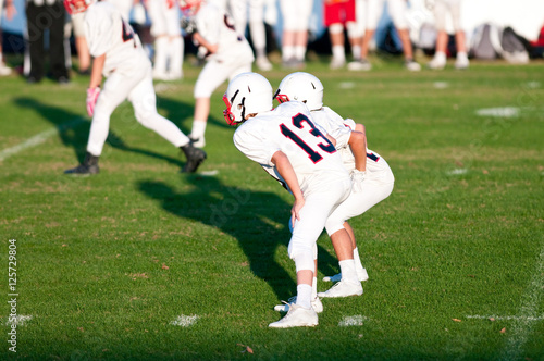 Fotografía Youth football quarterback and running back