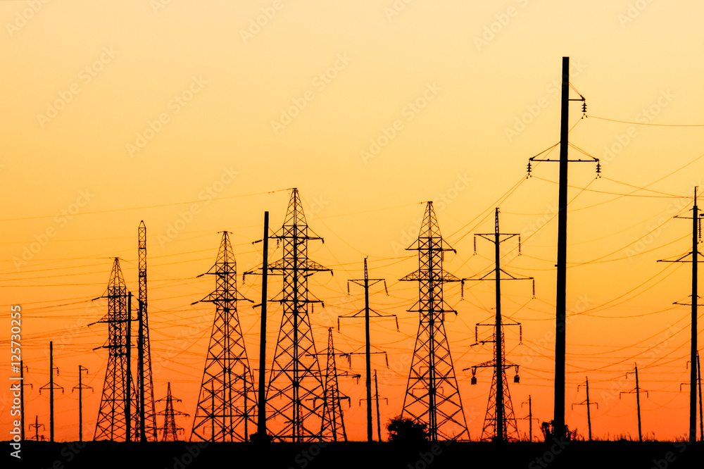 High voltage power lines at sunset
